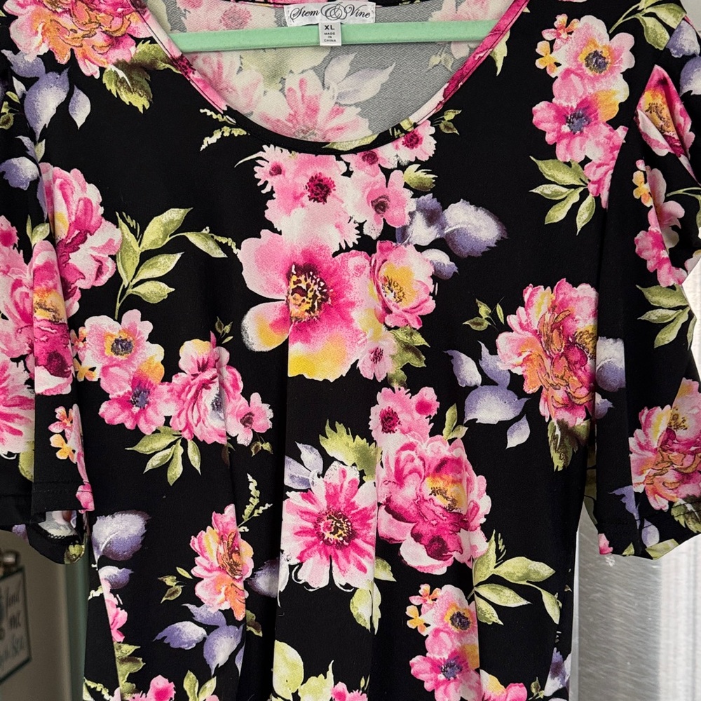 Vibrant Floral Blouse with Pink and Black Design